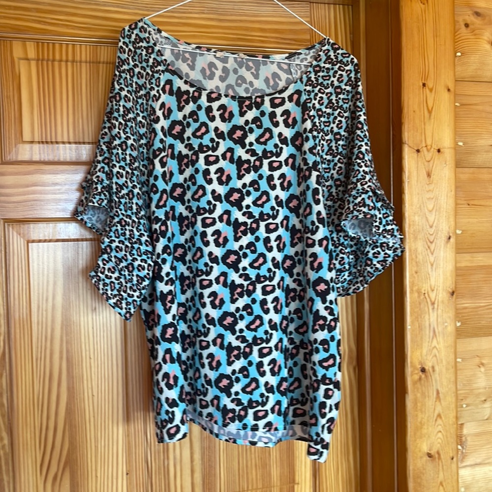 Super cute leopard print size xl blouse only worn a couple of times
